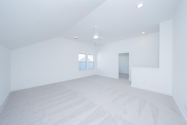 bonus room with recessed lighting, a ceiling fan, light carpet, vaulted ceiling, and baseboards