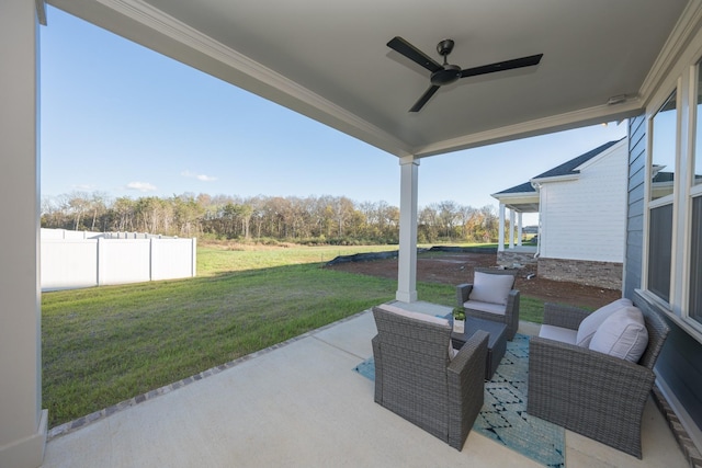 view of patio featuring an outdoor hangout area, fence, and a ceiling fan