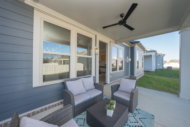 view of patio / terrace featuring ceiling fan and an outdoor living space