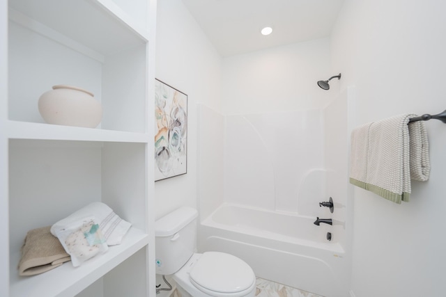 full bathroom featuring washtub / shower combination and toilet