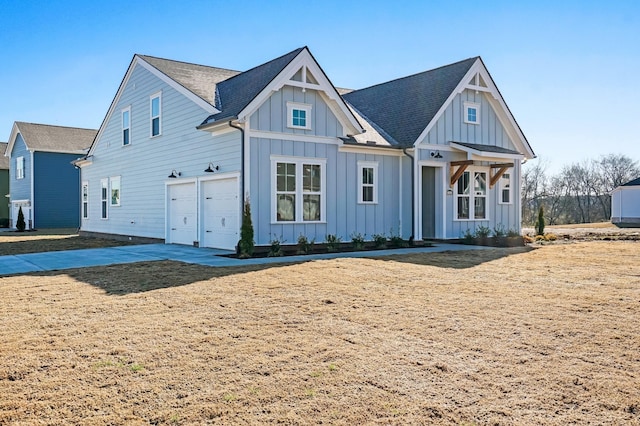 modern farmhouse with board and batten siding, roof with shingles, and an attached garage