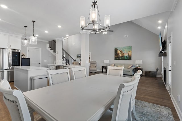 dining space with dark wood-style floors, stairs, baseboards, and recessed lighting