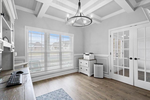 office space featuring beam ceiling, wood finished floors, and french doors