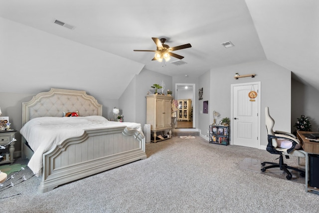 carpeted bedroom featuring vaulted ceiling, visible vents, and a ceiling fan