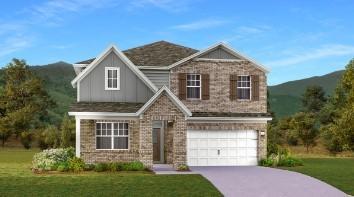 view of front of home with a front yard, driveway, an attached garage, and a mountain view