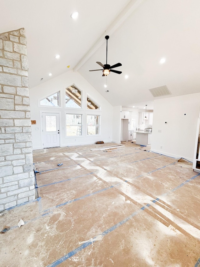 unfurnished living room with baseboards, ceiling fan, high vaulted ceiling, beam ceiling, and recessed lighting