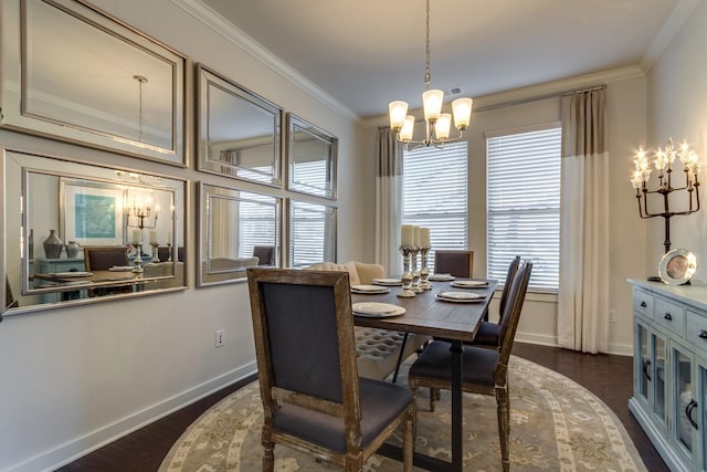 dining space featuring a chandelier, ornamental molding, dark wood finished floors, and baseboards