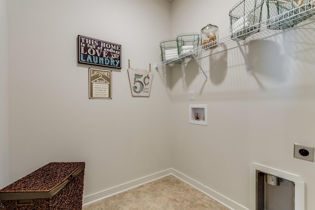 washroom featuring laundry area, light tile patterned floors, baseboards, hookup for an electric dryer, and washer hookup