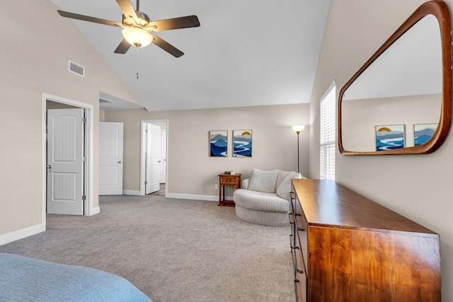 interior space featuring high vaulted ceiling, baseboards, visible vents, and ceiling fan