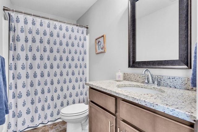 full bathroom with vanity, toilet, and a shower with curtain