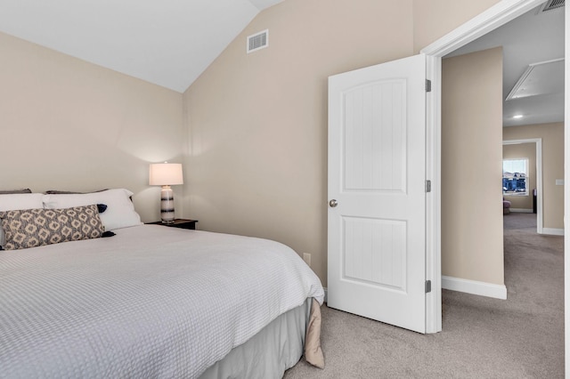 bedroom featuring lofted ceiling, baseboards, visible vents, and light colored carpet