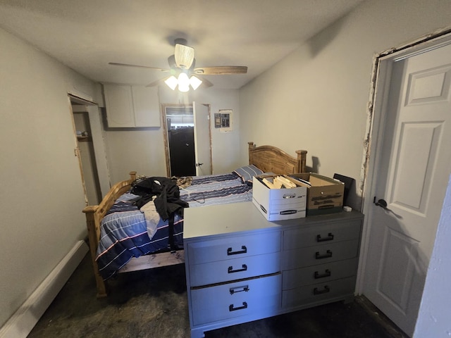 bedroom featuring ceiling fan and baseboards