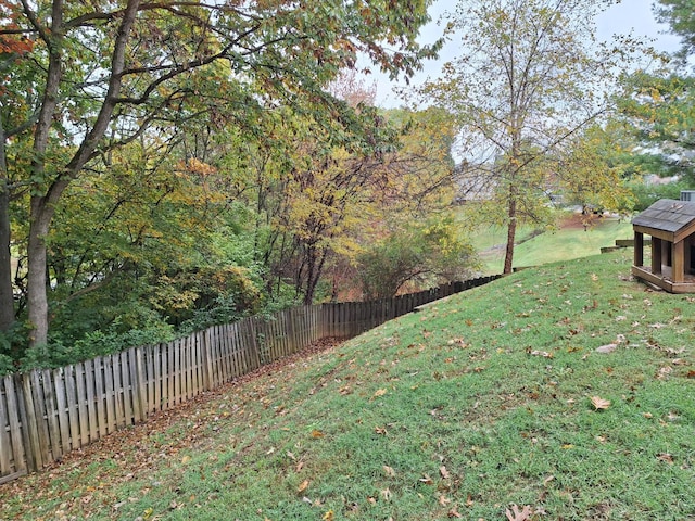 view of yard with fence