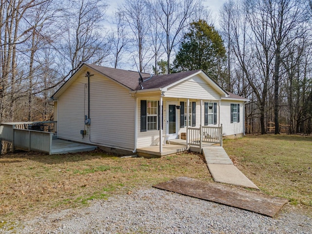 view of front of property with crawl space and a front yard