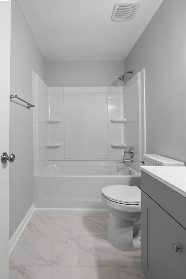 bathroom featuring marble finish floor, visible vents, toilet, vanity, and  shower combination