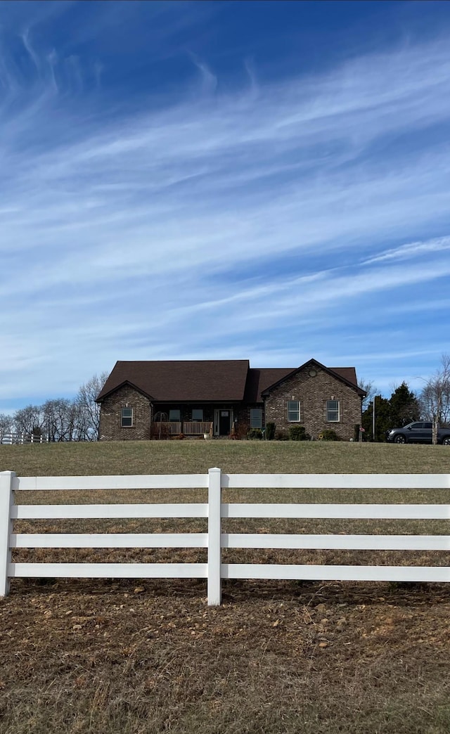 view of front facade with a fenced front yard