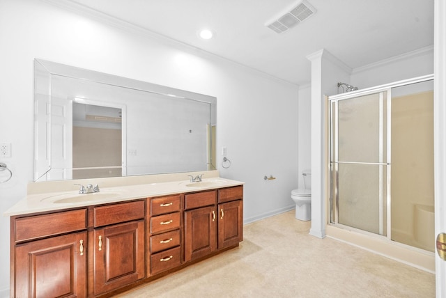 bathroom featuring visible vents, toilet, ornamental molding, a sink, and a shower stall