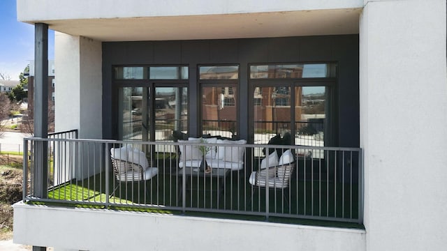 doorway to property with stucco siding