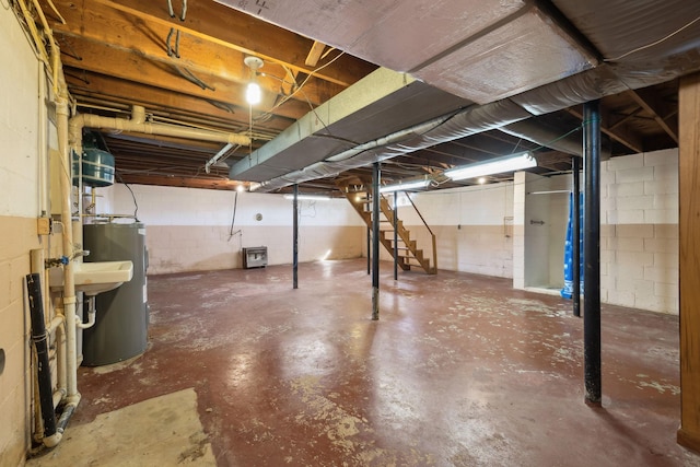 unfinished basement with electric water heater