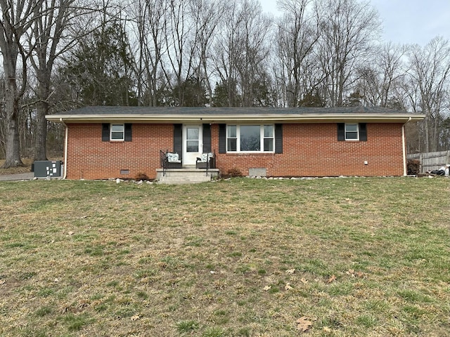 ranch-style home with a front yard, crawl space, and brick siding