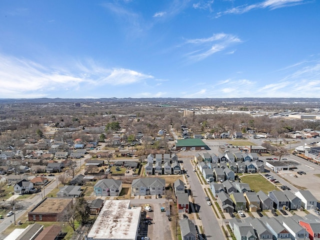 birds eye view of property with a residential view