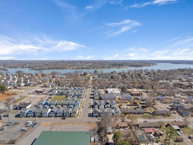 aerial view featuring a water view and a residential view