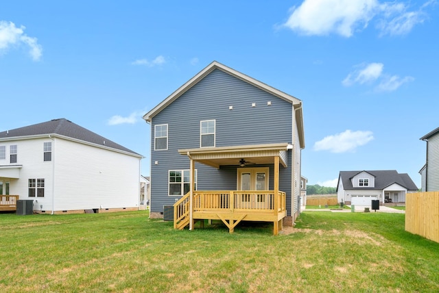 148 Cardinal Crk, Clarksville, TN 37040 - rear view of house featuring a deck, central AC, ceiling fan, and a yard