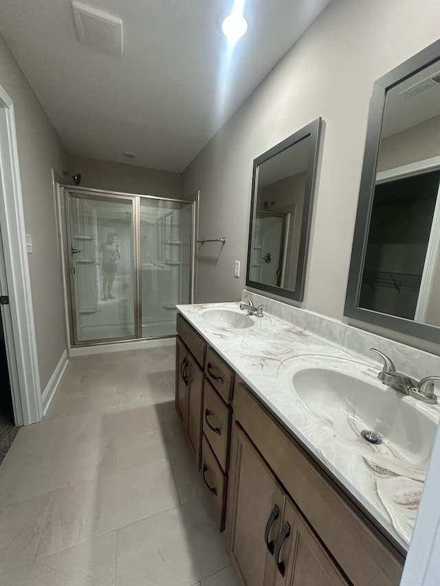 148 Cardinal Crk, Clarksville, TN 37040 - bathroom with a stall shower and double vanity