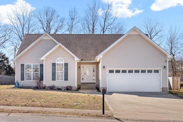 ranch-style home with an attached garage, fence, driveway, roof with shingles, and a front yard