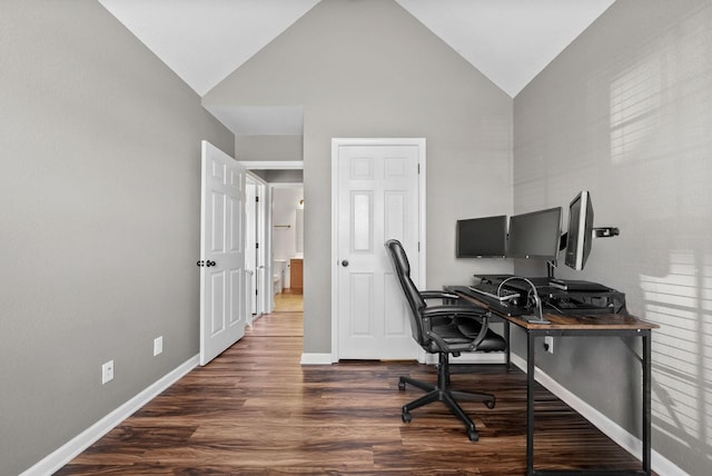 office area featuring high vaulted ceiling, wood finished floors, and baseboards