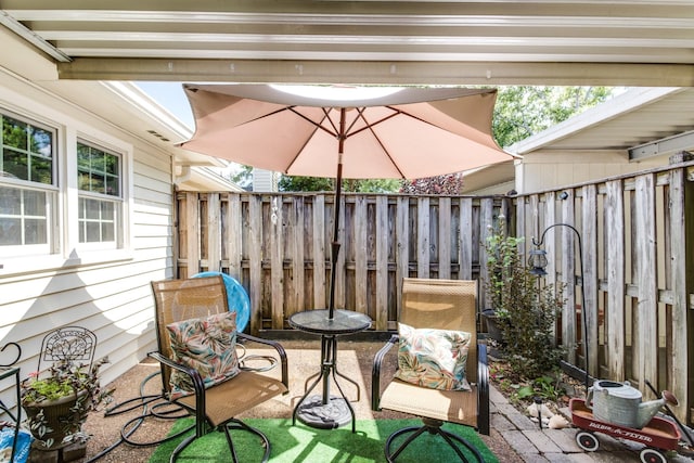 view of patio / terrace with fence