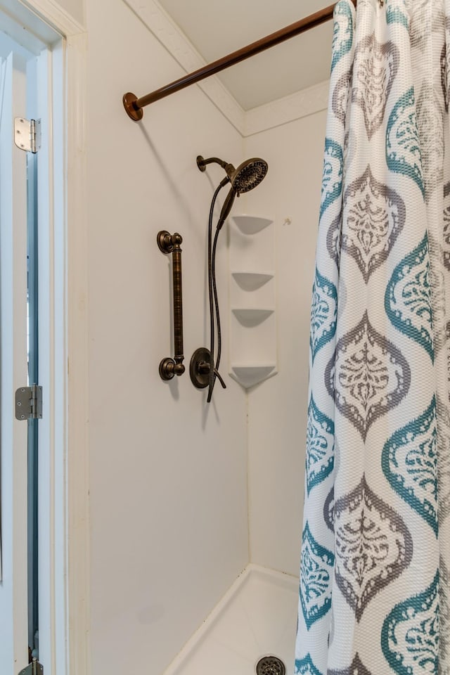 details with curtained shower