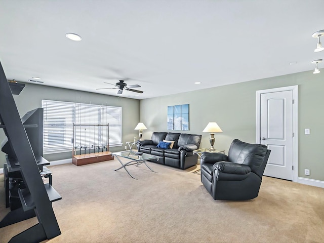 carpeted living area with recessed lighting, a ceiling fan, and baseboards