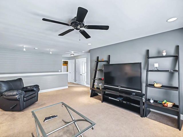 living room featuring ceiling fan, baseboards, carpet flooring, and recessed lighting