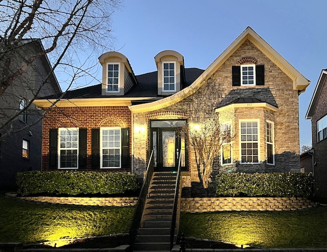 view of front of property featuring brick siding