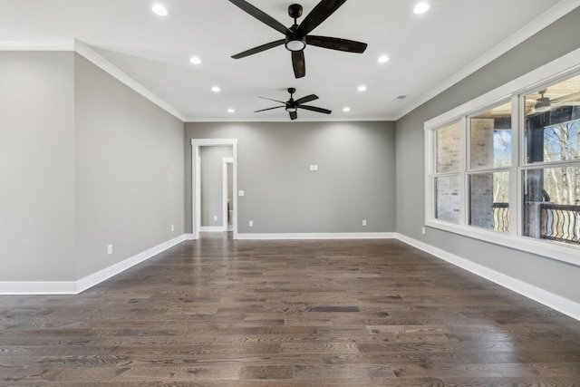 empty room featuring dark wood-type flooring, recessed lighting, crown molding, and baseboards