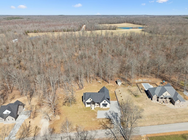 birds eye view of property with a rural view