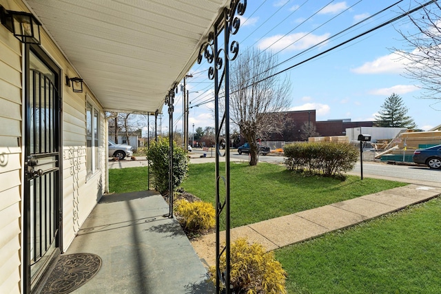 view of yard with a porch