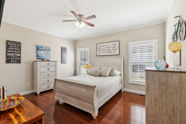 bedroom featuring dark wood-style floors, baseboards, and ornamental molding