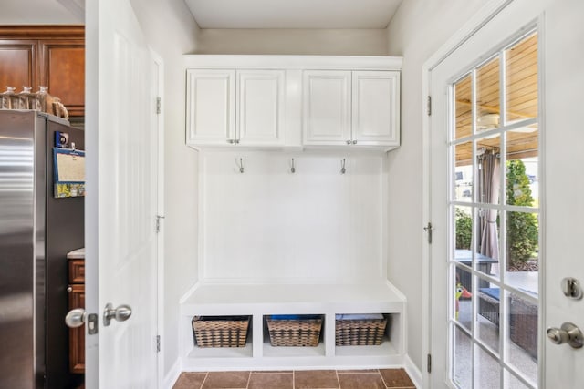 mudroom with tile patterned floors