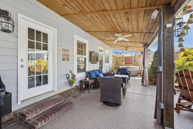 view of patio with a porch and a ceiling fan