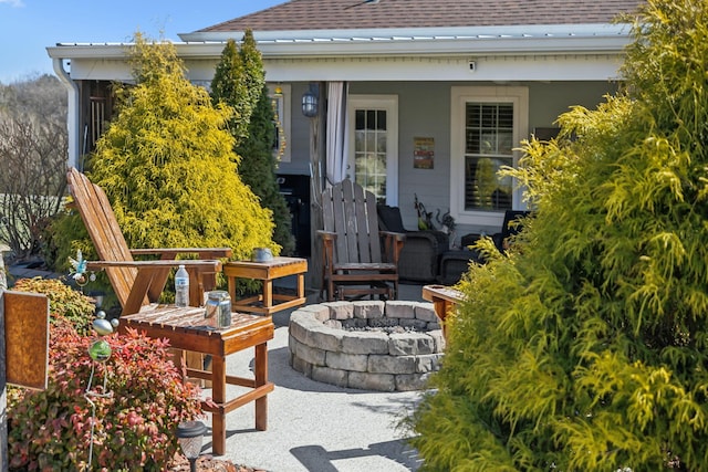 view of patio / terrace with a fire pit