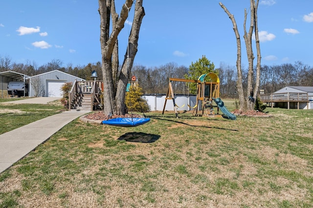 view of play area with a yard and an outdoor structure