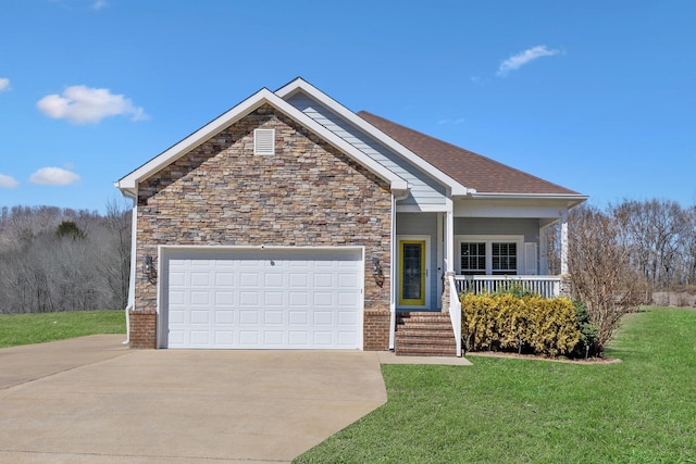 view of front of home with driveway, a front lawn, stone siding, a porch, and an attached garage