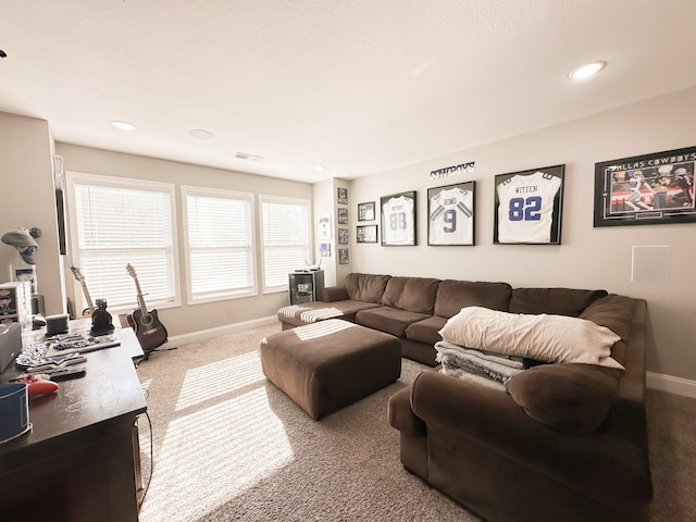 living area featuring recessed lighting, carpet, visible vents, and baseboards