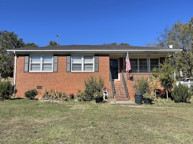 bungalow-style house with crawl space, a front lawn, and brick siding