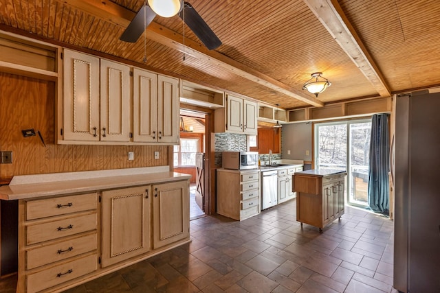 kitchen featuring wooden ceiling, beam ceiling, stainless steel appliances, open shelves, and a sink