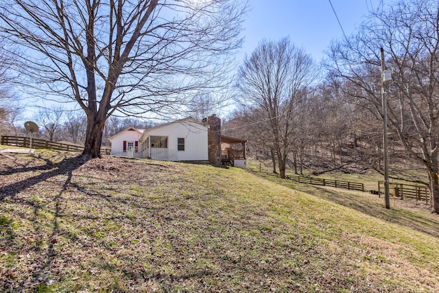 view of yard with fence