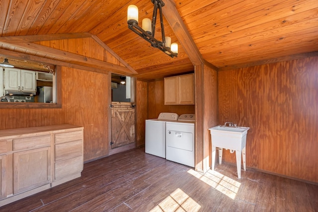 laundry room with dark wood-style floors, wooden ceiling, cabinet space, and washer and dryer