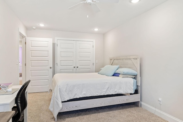 bedroom with carpet, baseboards, a closet, and recessed lighting